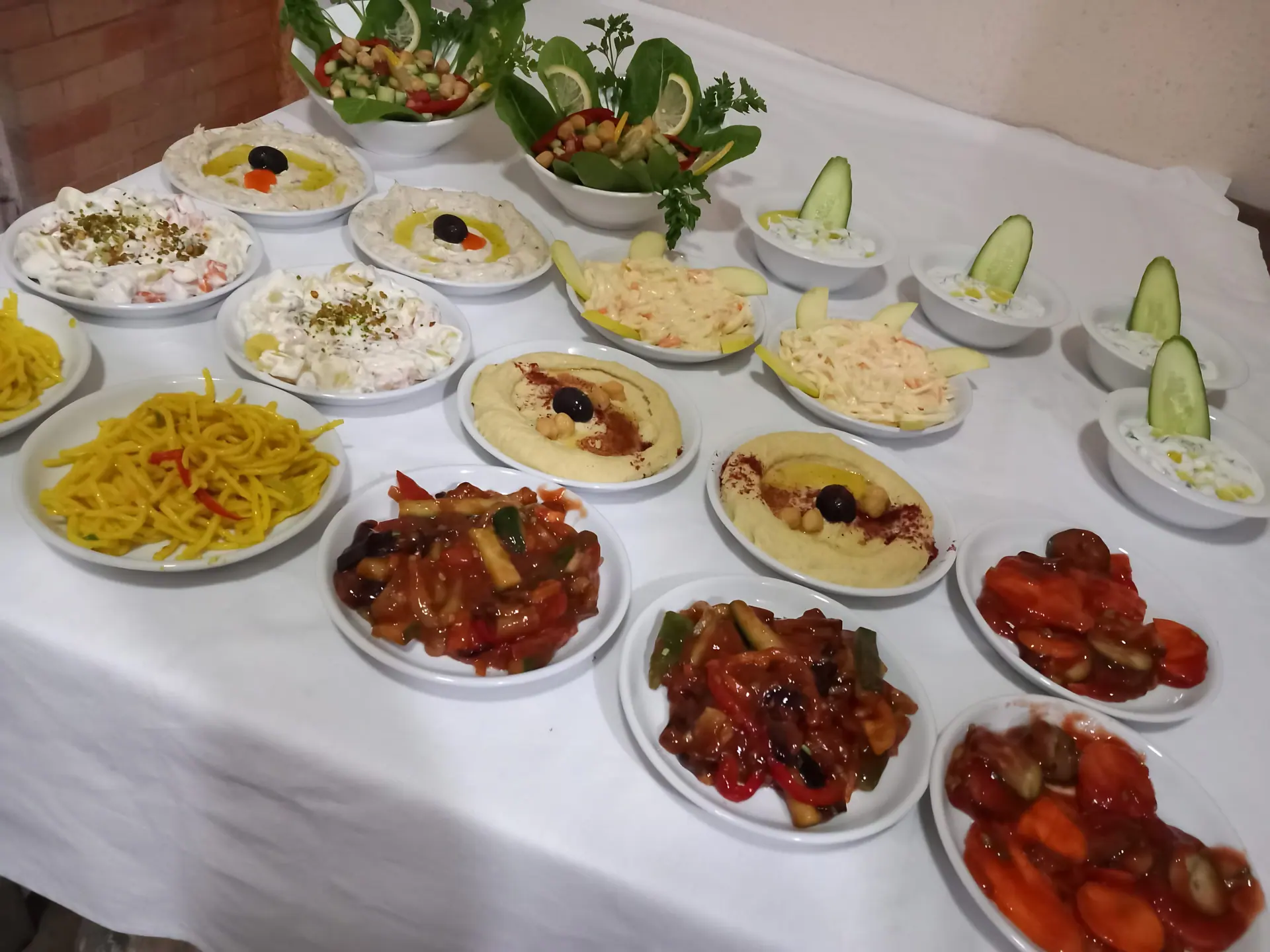 Plated rice dishes and sides ready for serving