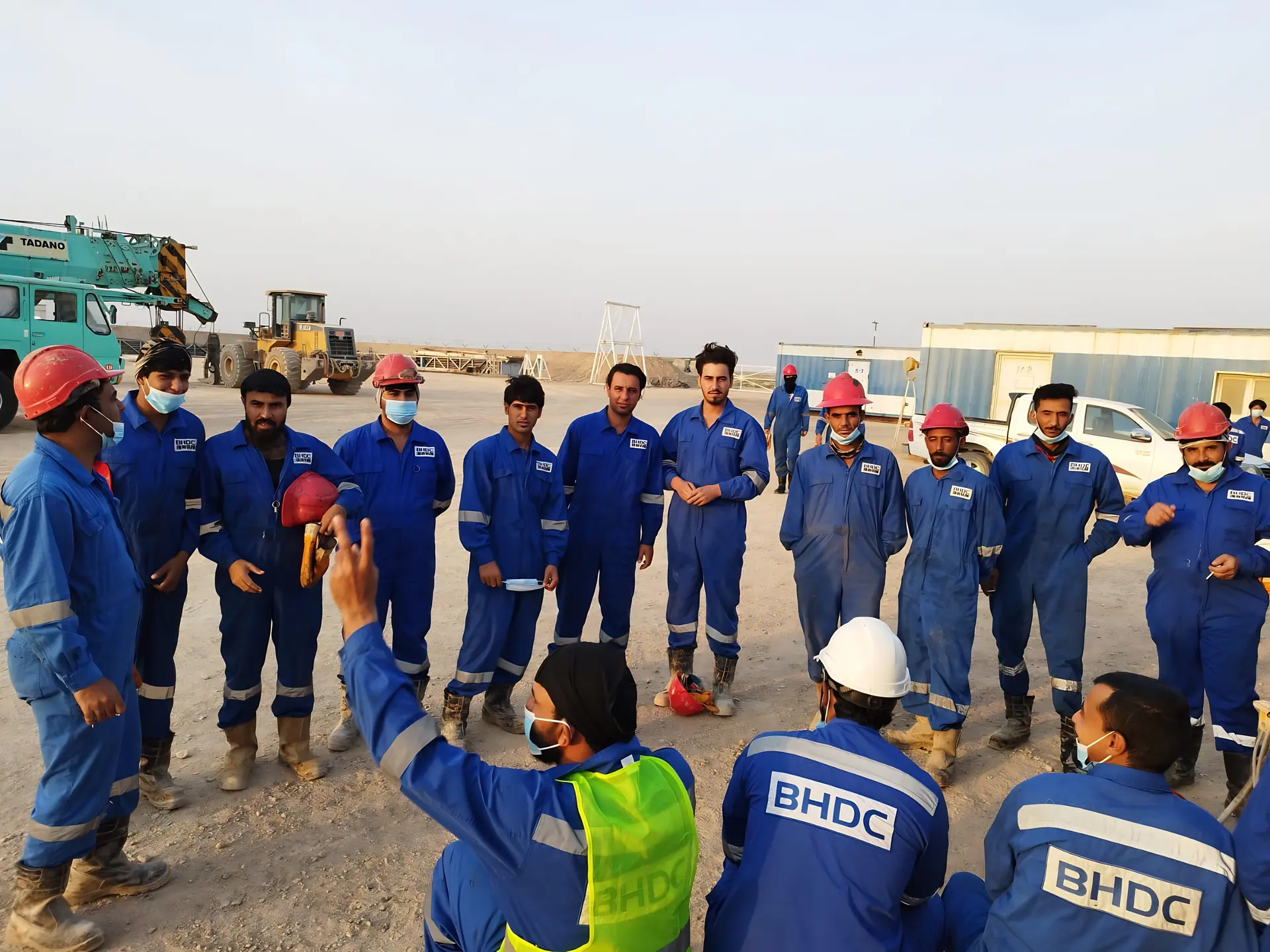 Toolbox talk with a field crew
